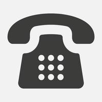 Old telephone vector icon isolated on white background.