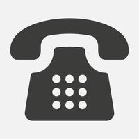 Old telephone vector icon isolated on white background.