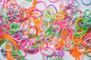 Rubber band Colorful of plastic band on white background photo