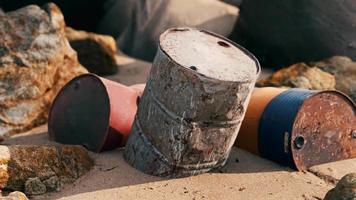 old oil barrell on the sand beach video