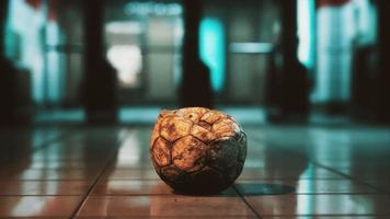 old soccer ball in empty subway video