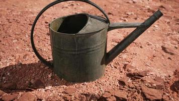 Beverage can in sand and rocks desert video