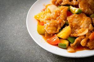 Stir fried sweet and sour sauce with pork photo