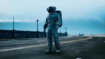 astronaut in space suit on the road bridge video