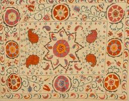Background from the tissue with oriental ornaments and multi colored pattern, textile photo