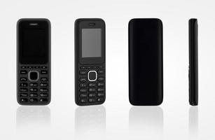 push-button mobile phone on white background with reflection photo