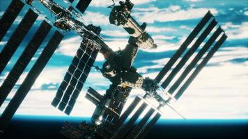 International Space Station over the planet earth Elements furnished by NASA video