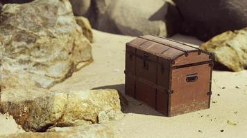 treasure chest in sand dunes on a beach video