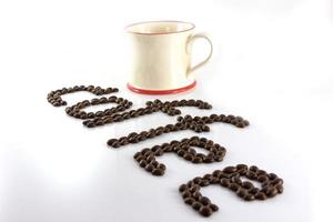 granos de café aislar sobre fondo blanco foto