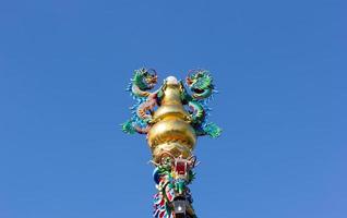 Dragon pole  with blue sky nature background photo