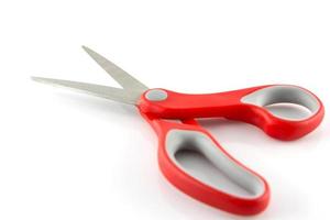 red scissors isolate on white background photo