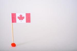 The concept of Canada Day greetings. Canada's national flags. photo