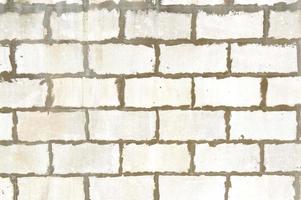 Old brick wall. Ancient stone texture background. Urban background, white ruined industrial brick wall with copy space. Home and office design backdrop. Vintage effect photo