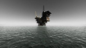 oil rig and offshore vessel at the sunset photo