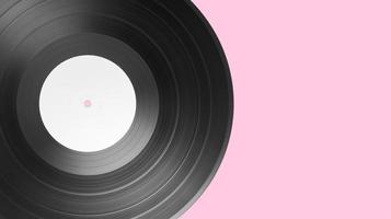 Vinyl record on pink background with copy space. White label mock up