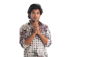 Young man posing on a white background photo