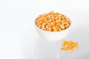 Close-up of Dried corn in clay pot photo