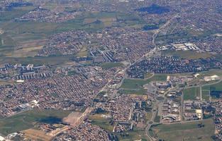 Aerial view from a flying plane in the sky photo