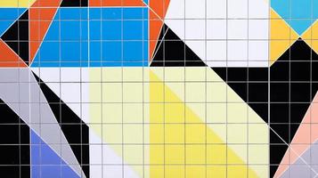 Mosaic on the big wall of different shapes and colors. Abstract colorful mosaic texture background photo