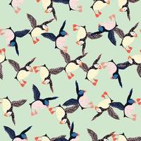 Ornithology seamless pattern with random creative puffin bird ornament. Light blue background. Simple design. vector