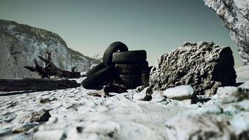 old abandoned tyres on sea shore video