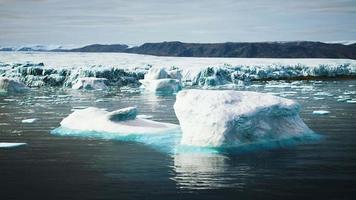 Antarctic icebergs near rocky beach video