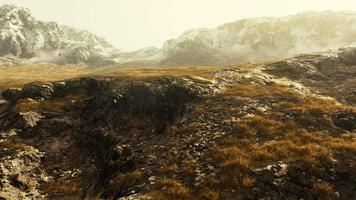 lanscape with barren mountain which is covered with ice video