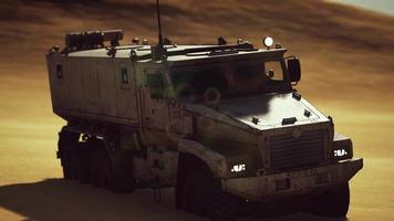Armoured military truck in desert video