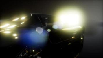 coche deportivo de lujo en estudio oscuro con luces brillantes foto