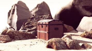 treasure chest in sand dunes on a beach photo