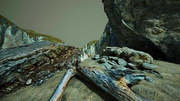 Hyperlapse of deserted beach and rocky cliff photo