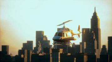 Silhouette helicopter at city scape background photo