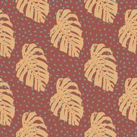 Doodle floral seamless pattern with hand drawn orange monstera ornament. Maroon background with dots. vector