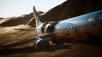 abandoned crushed plane in desert photo