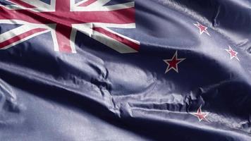 Nya Zeelands textilflagga vajar på vindslingan. Nya Zeelands banderoll svajar på vinden. tyg textilvävnad. full fyllning bakgrund. 10 sekunders loop. video