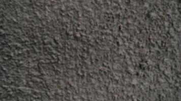 Defocused background on abstract cement on a wall with copy text space. photo