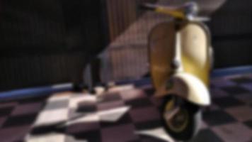 Defocused background of vintage scooter in garage with copy text space. photo