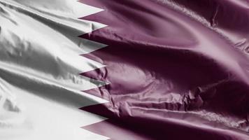 Quatar flag waving on the wind loop. Qatari banner swaying on the breeze. Full filling background. 10 seconds loop. video