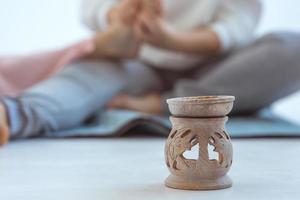 Hands making thai feet massage. Alternative medicine and thai massage concept photo