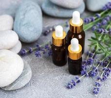Essential oil with fresh lavender photo