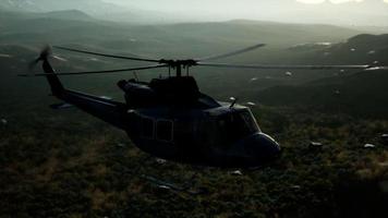 Slow Motion United States military helicopter in Vietnam photo