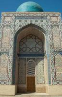 Arch and architecture of the ancient Registan in Samarkand. Ancient architecture of Central Asia photo