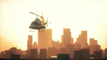 Silhouette helicopter at city scape background photo