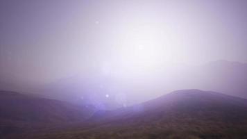 Aerial Green Hills Landscape in Fog photo