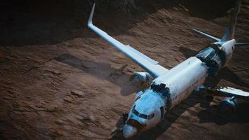 abandoned crushed plane in desert photo