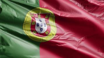 bandeira de portugal acenando lentamente no loop de vento. bandeira portuguesa balançando suavemente na brisa. fundo de preenchimento completo. Ciclo de 20 segundos. video