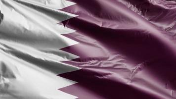 Quatar flag slow waving on the wind loop. Qatari banner smoothly swaying on the breeze. Full filling background. 20 seconds loop. video