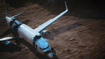 abandoned crushed plane in desert photo