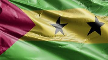 Sao Tome and Principe flag slow waving on the wind loop. Sao Tome and Principe banner smoothly swaying on the breeze. Full filling background. 20 seconds loop. video