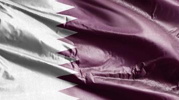 Quatar textile flag waving on the wind loop. Qatari banner swaying on the breeze. Fabric textile tissue. Full filling background. 10 seconds loop. video